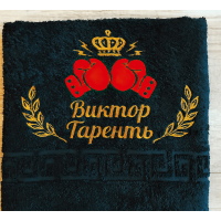 Черное полотенце с орнаментом вышивки